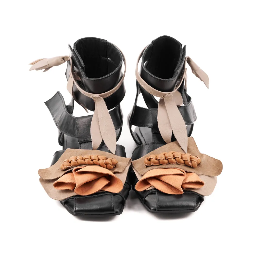 Light is my Accomplice black leather and beige suede sandals